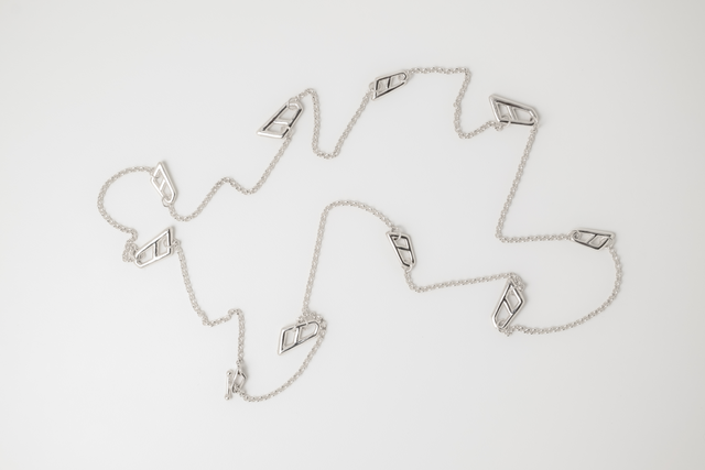 Long Chain with Signature Links in silver: small round links and spaced angular STRUGA elements