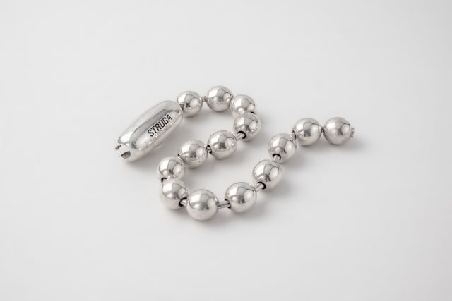 Strugadesign Bracelet big beads with capsul.
