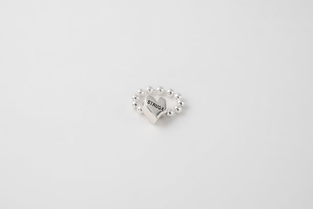 Strugadesign Heаrat lock ring.