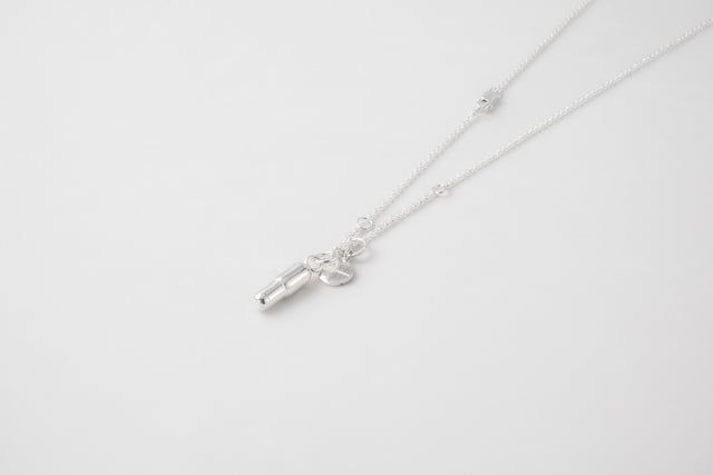 Strugadesign Necklace pills.