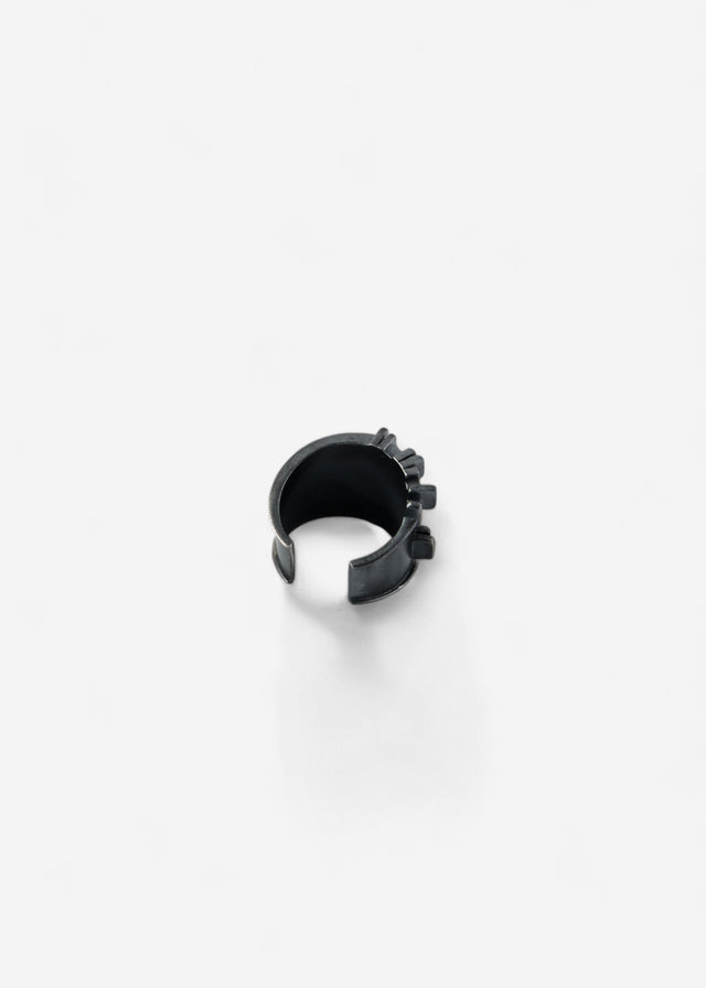 Dark silver Brutalism V.3 ear cuff seen from above, open ends and stepped bars on a white background